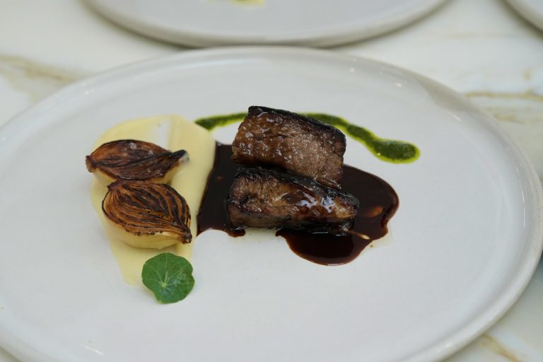Elegantly plated course dish – Refine Catering Sydney